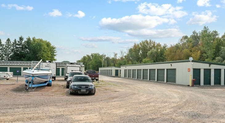Drive-up access storage units with outdoor rental parking for RVs and cars