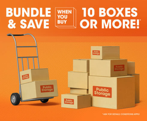 moving dolly beside a stack of cardboard boxes. Image text reads bundle and save when you buy 10 boxes or more!